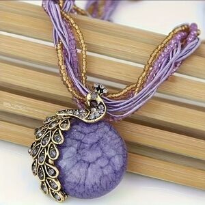 Purple and Gold Peacock Pendant Necklace